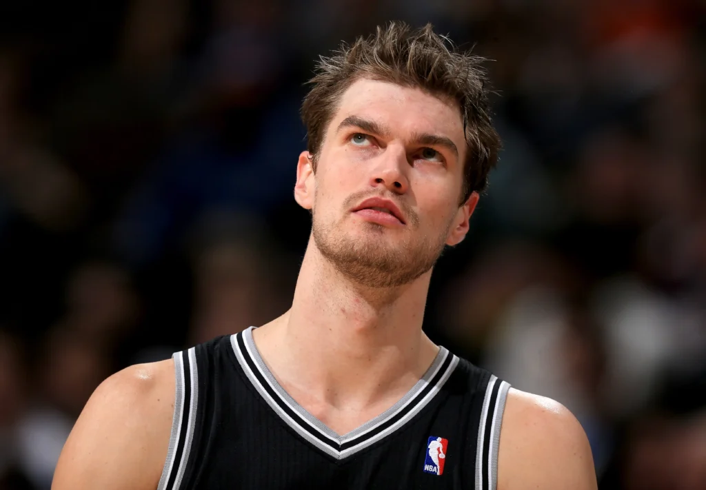 Tiago Splitter takes over as interim Portland Trail Blazers coach after Chauncey Billups federal arrest.